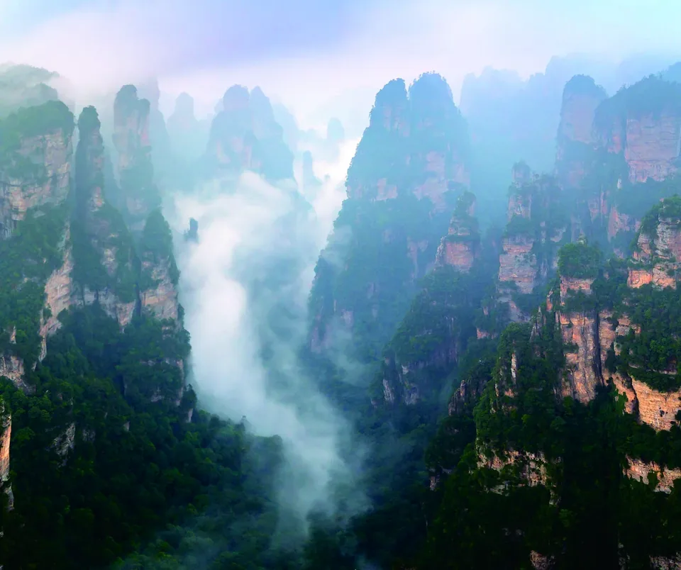 Peaks and a sea of clouds at sunrise